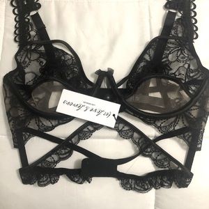 For love and Lemons black swirl bra. Size L, new with tags.